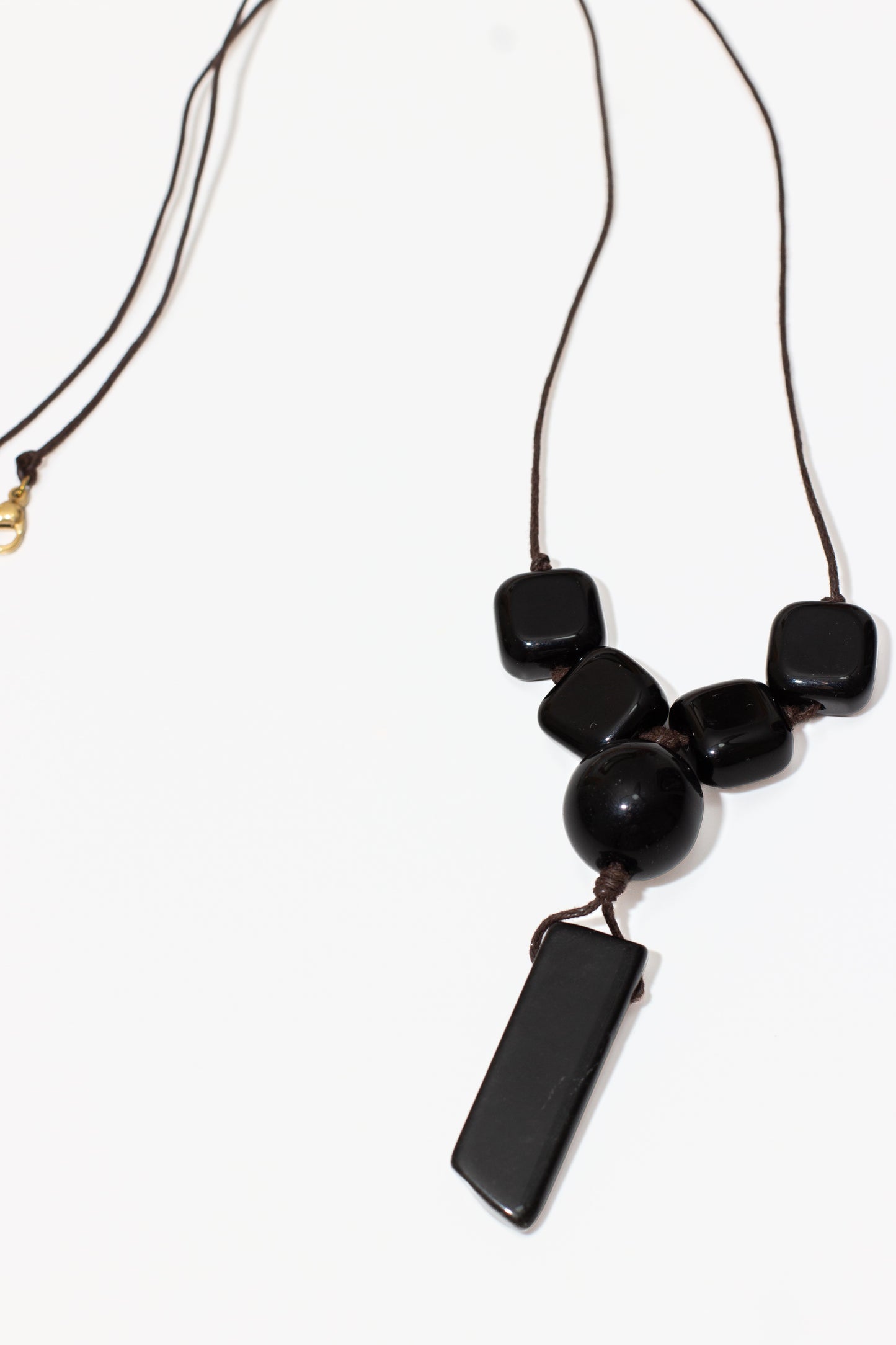 The Truth Obsidian & Black Agate Pendant