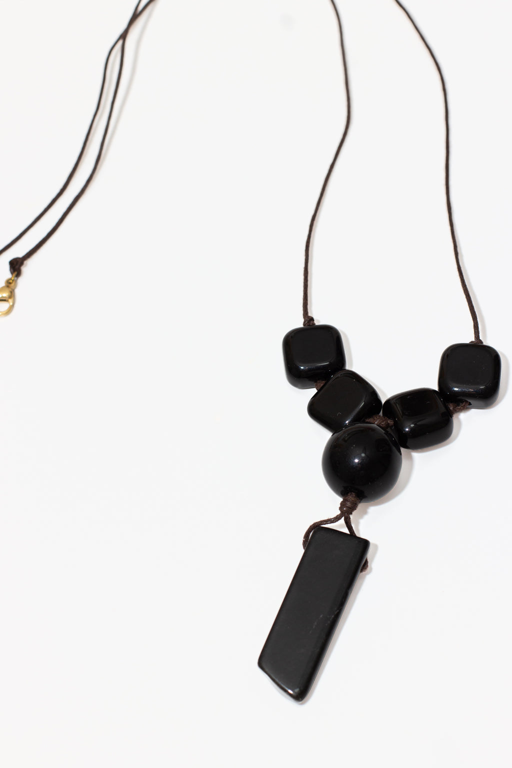 The Truth Obsidian & Black Agate Pendant