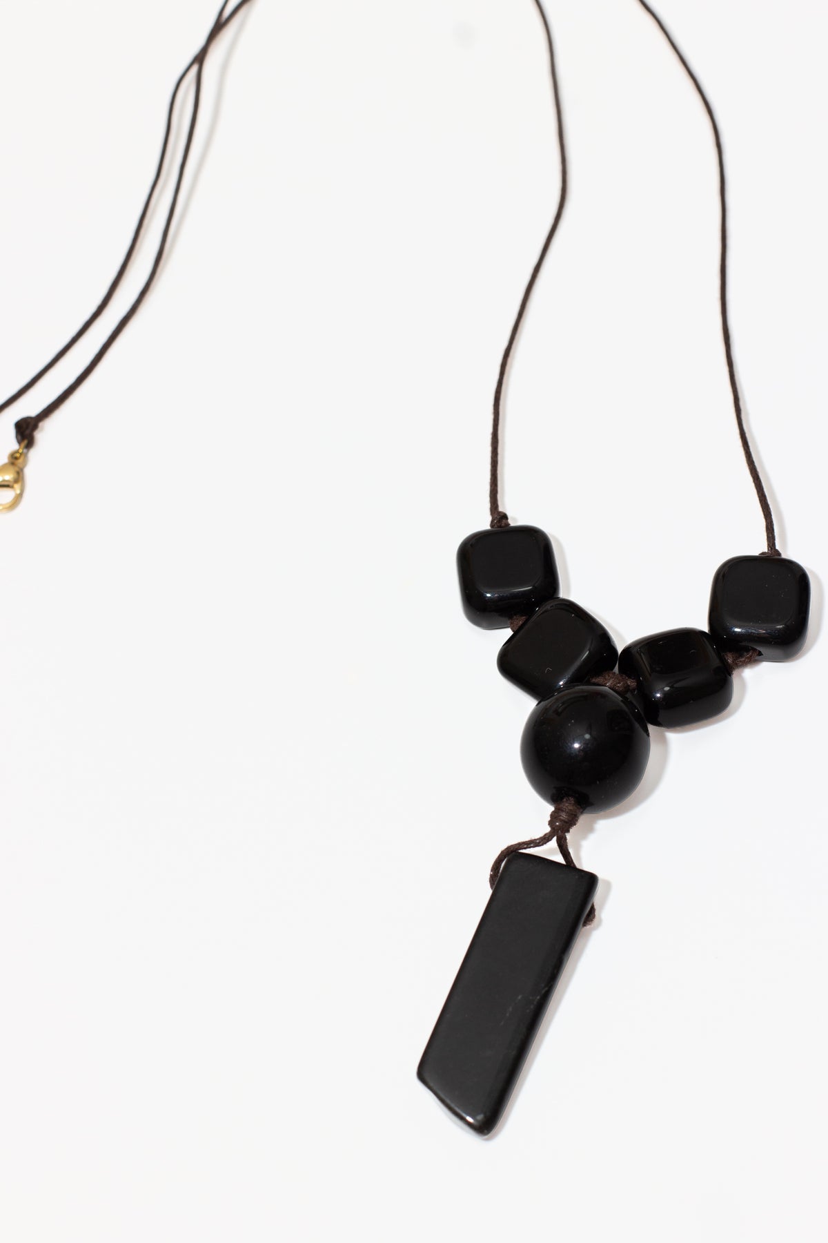 The Truth Obsidian & Black Agate Pendant