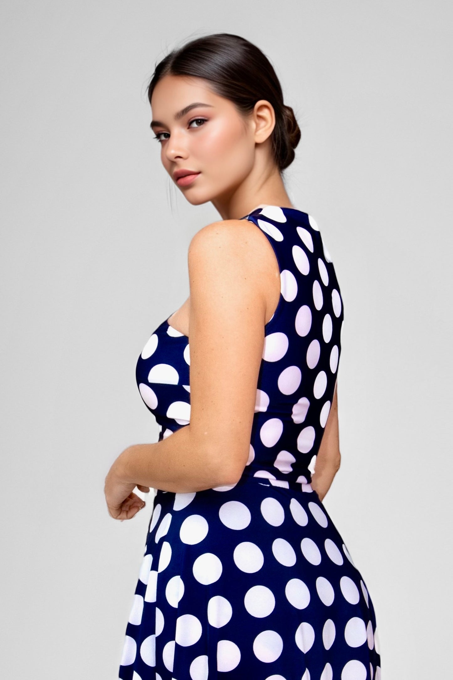 Vivacious Polka Dot High Neck Sleeveless Crop Top